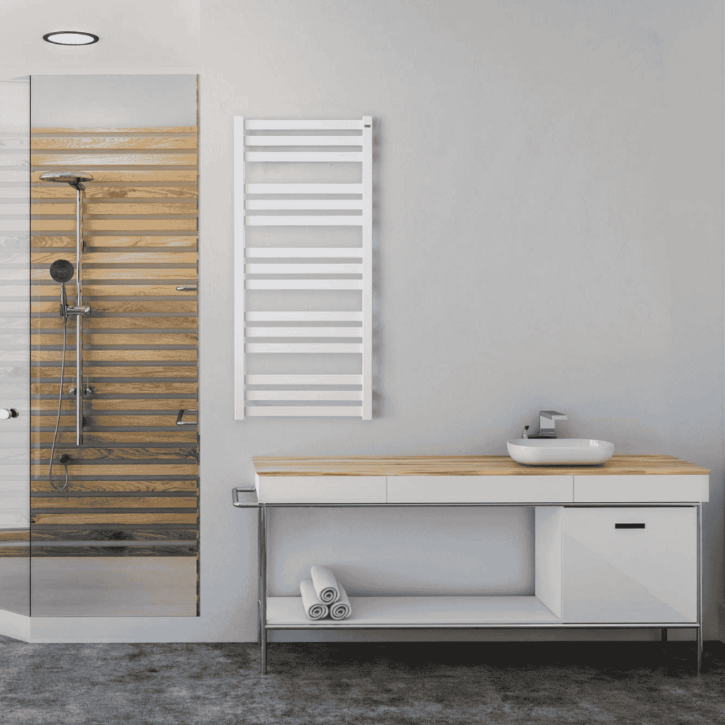 Nowoczesny grzejnik łazienkowy ENIX Hibiscus w kolorze białym w minimalistycznej łazience