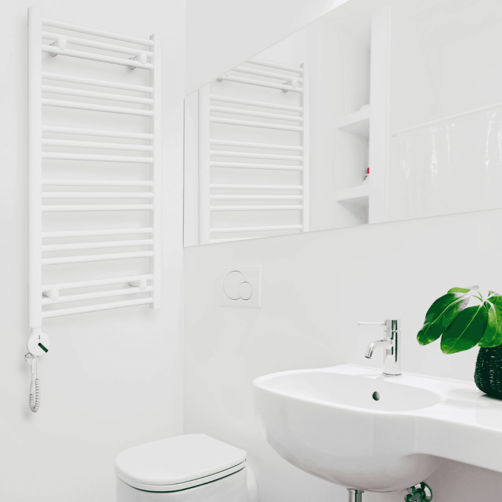 Grzejnik ENIX PT w kolorze białym w białej łazience