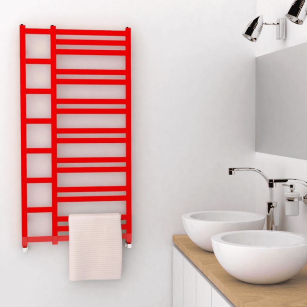 Oryginalny grzejnik ENIX Tales kolorze czerwonym na ścianie obok umywalki