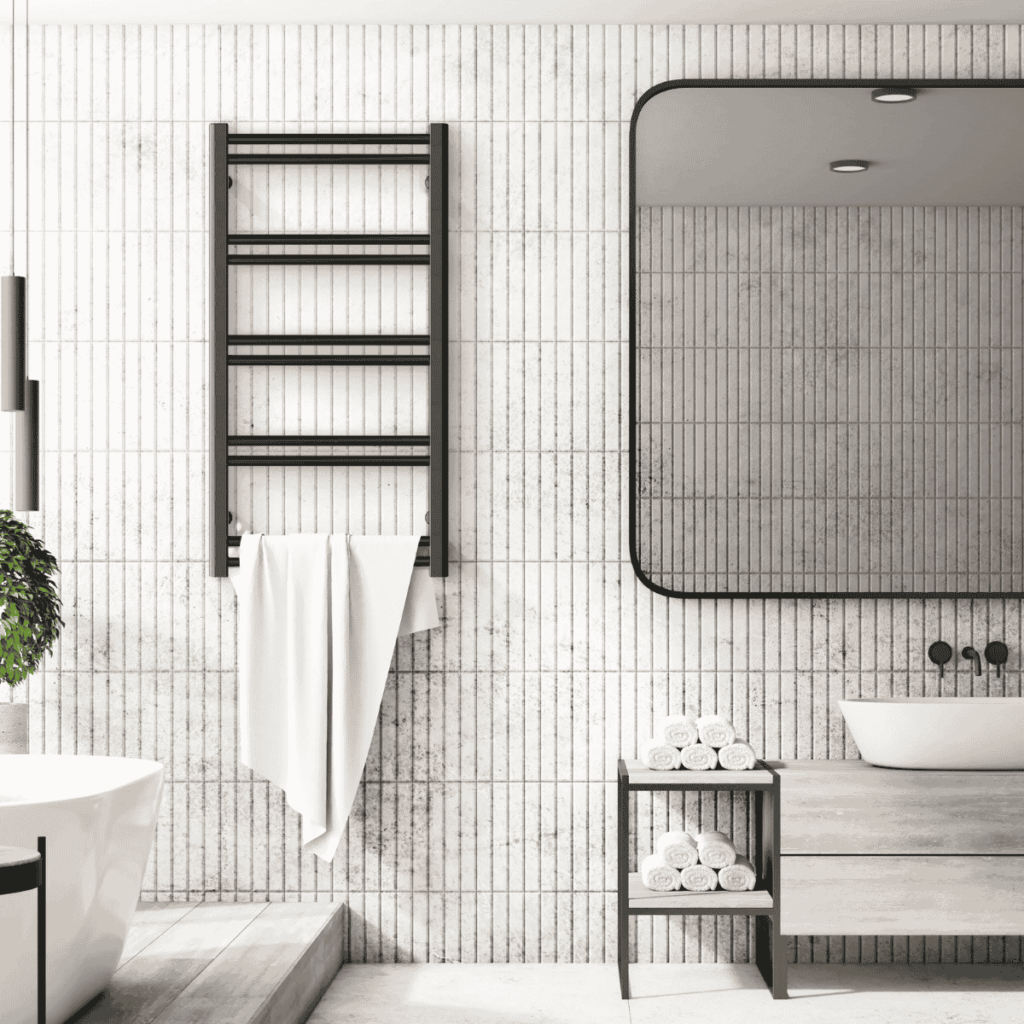 Grzejnik łazienkowy ENIX Uno w kolorze czarnym w nowoczesnej łazience